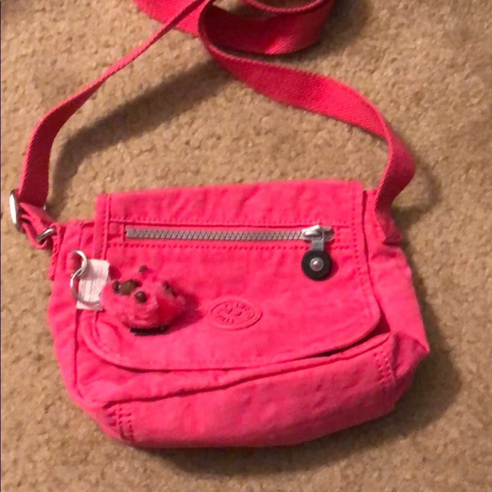 Kipling pink small crossbody purse. New.